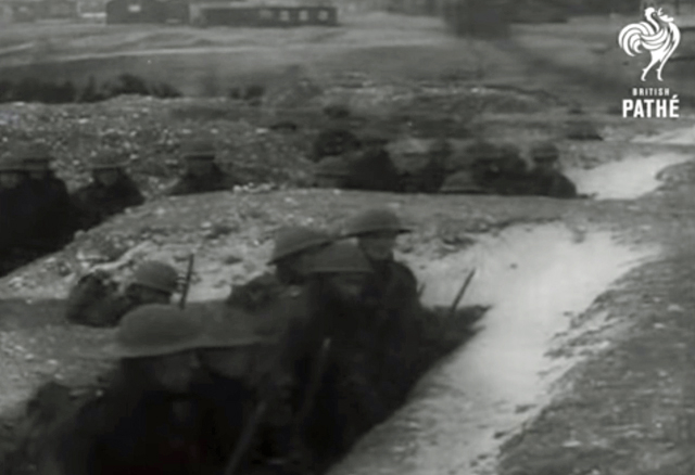A black and white screenshot showing three soliders from the battle of the Somme