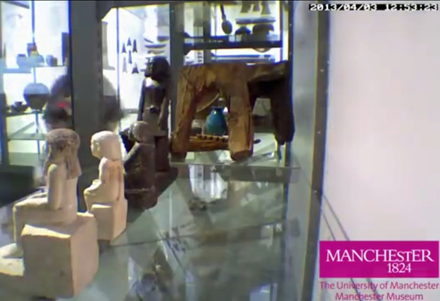 A screenshot showing the spinning statue from the Manchester Museum